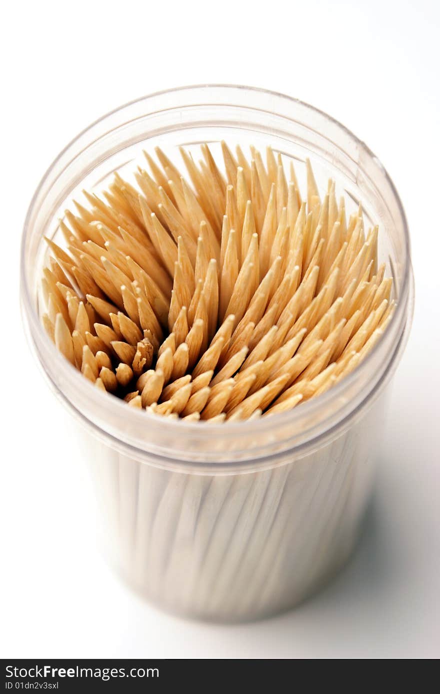 An overhead shot of a container of toothpicks.