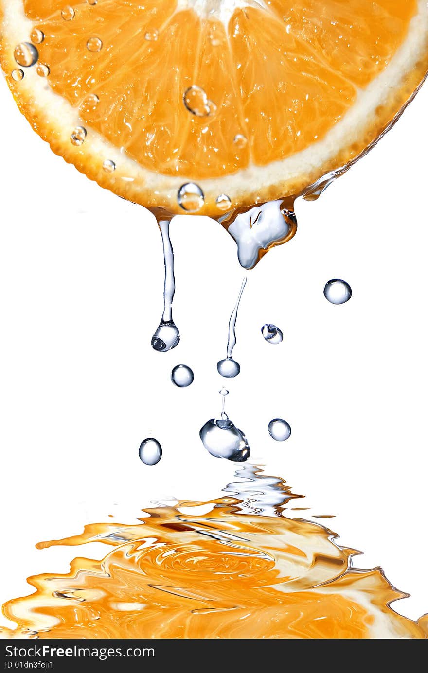 Fresh water drops on orange isolated on white