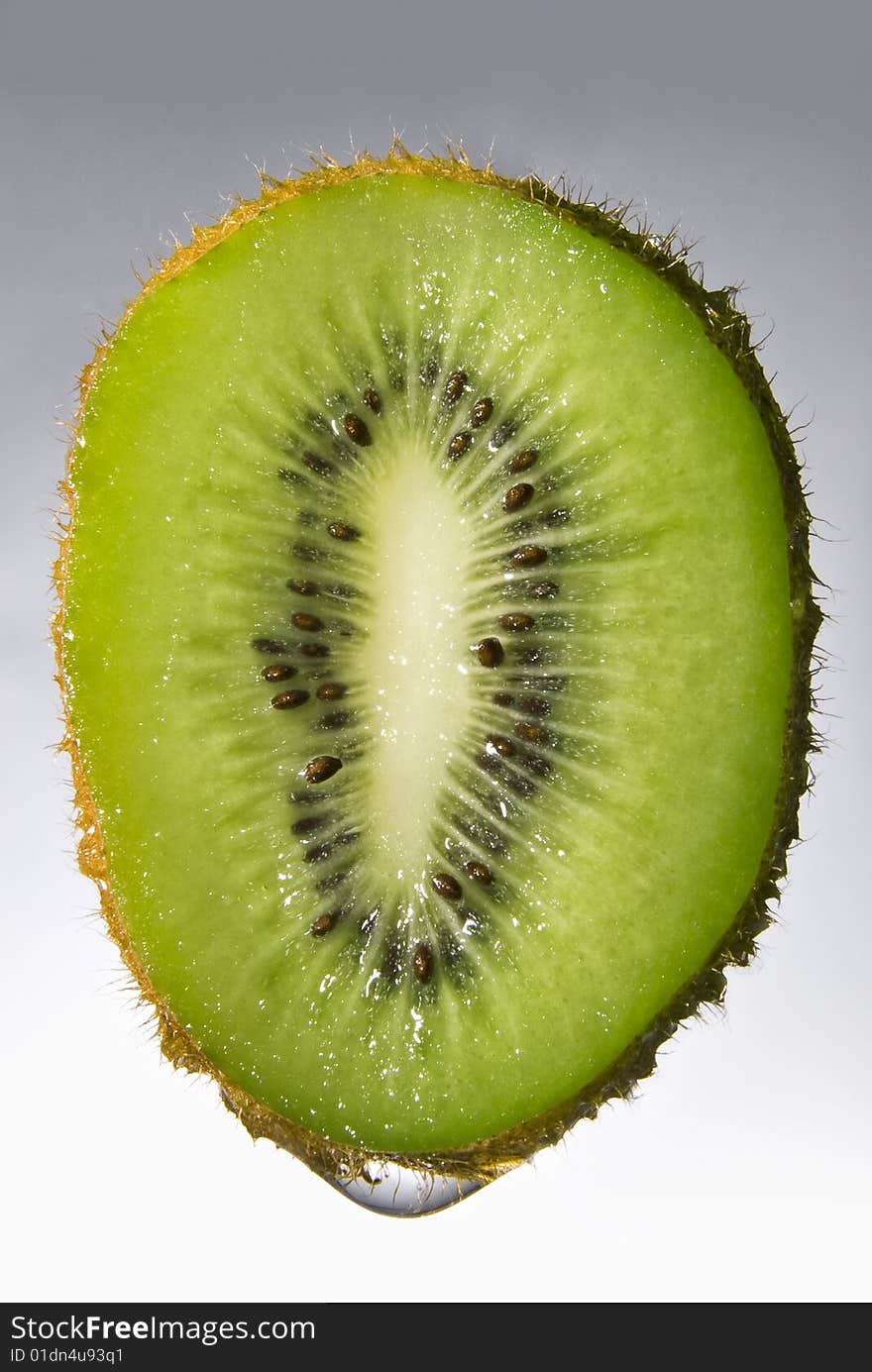 Fresh water drop on kiwi  isolated on white