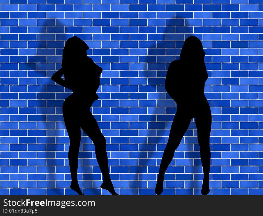 Two women in a sexy attitude against a brick background. Two women in a sexy attitude against a brick background