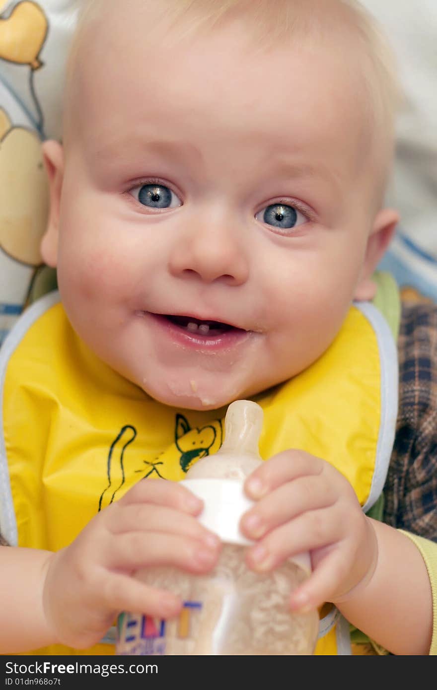 Photo of the little boy at breakfast. Photo of the little boy at breakfast