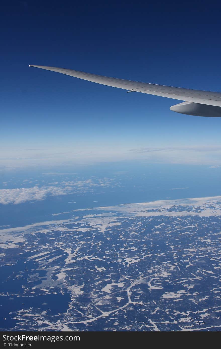 Earth and plane wings