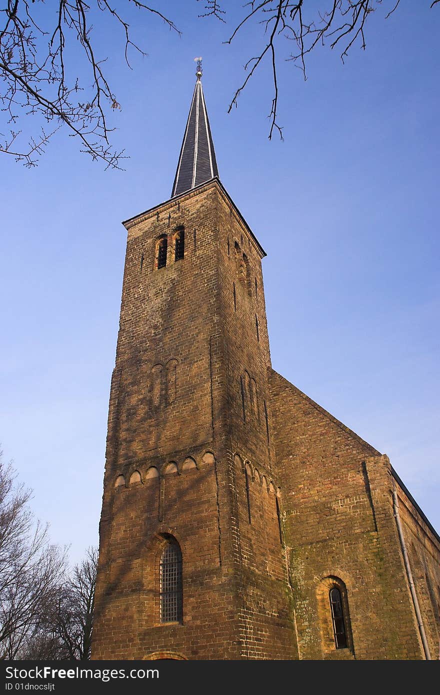 Very thin restored church tower. Very thin restored church tower.