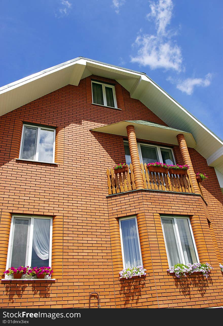 Dwelling-house on background of sky