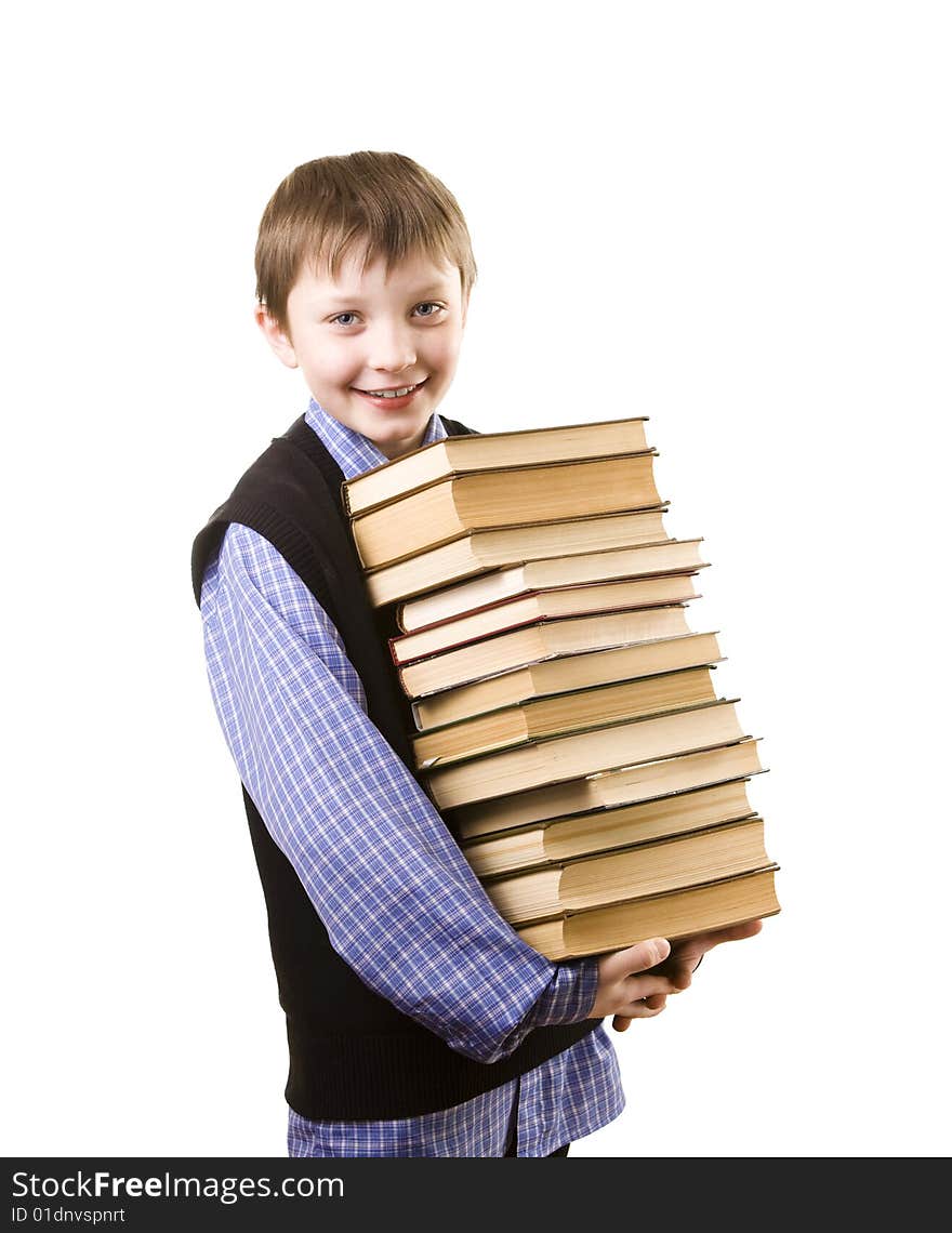 Young boy with a Stack of books. Young boy with a Stack of books