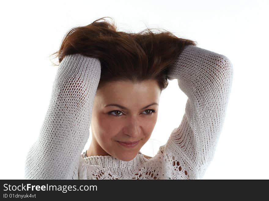 Woman in sweater isolated on white background