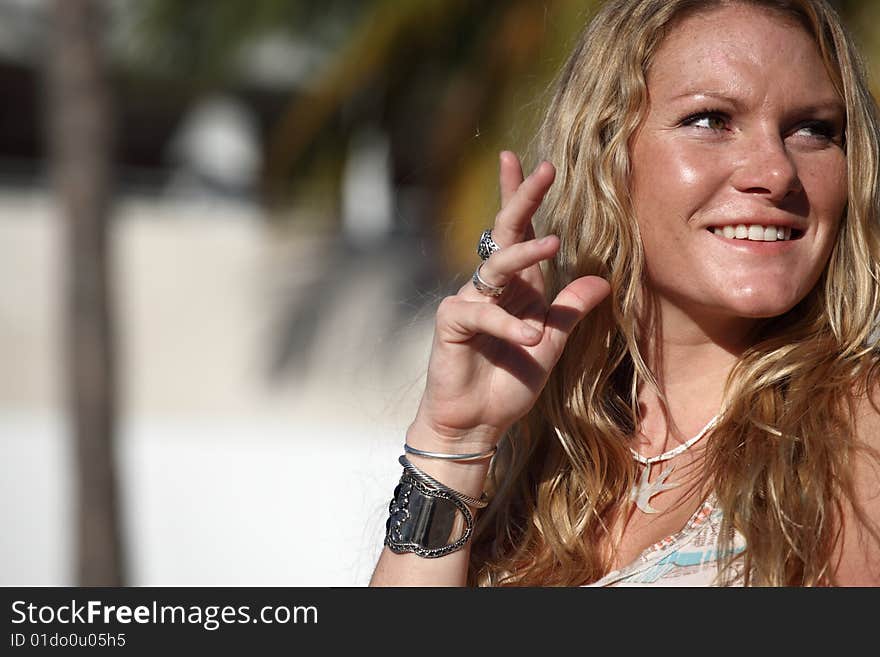 Beautiful young woman smiling at the camera. Beautiful young woman smiling at the camera