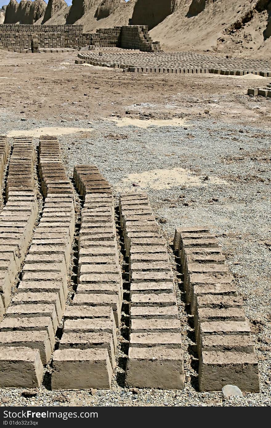 Mud bricks drying in the desert of Peru