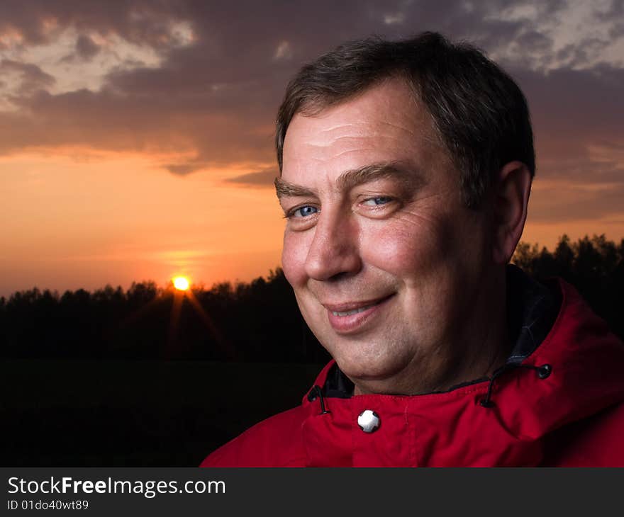 Portrait of a man outdoors against the sun