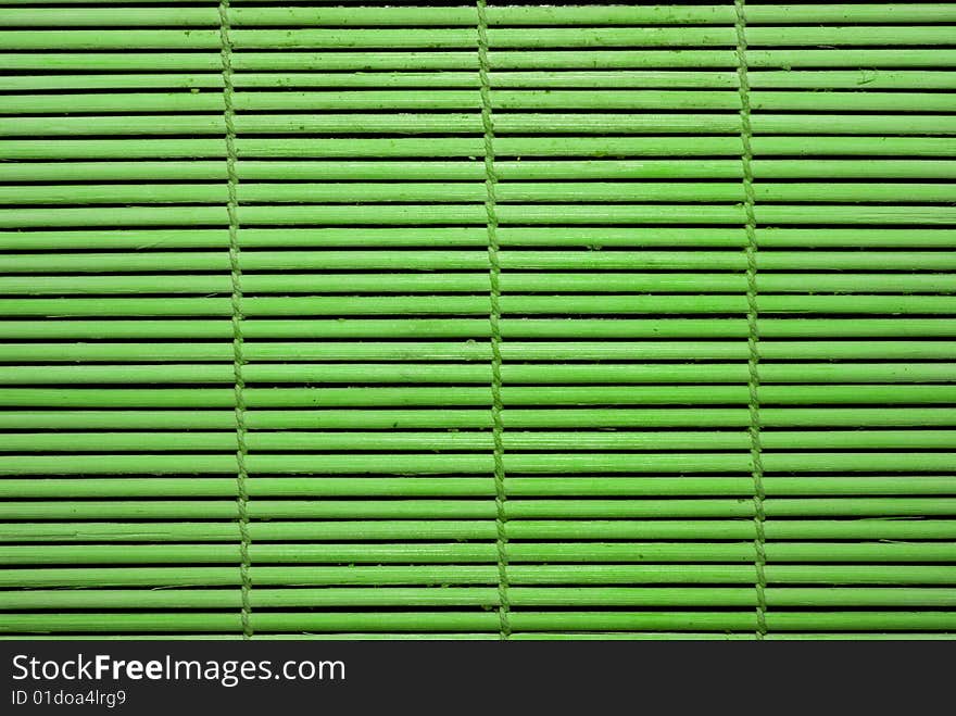 Green natural wickerwork background from bamboo stick. Green natural wickerwork background from bamboo stick