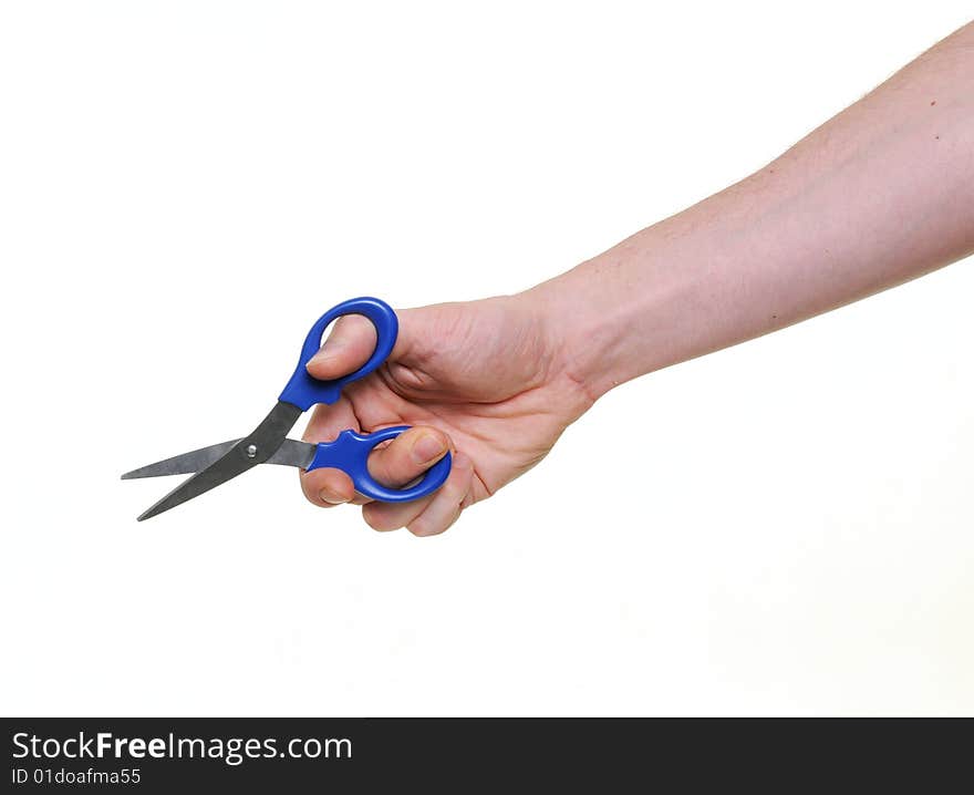 Hand holding scissors