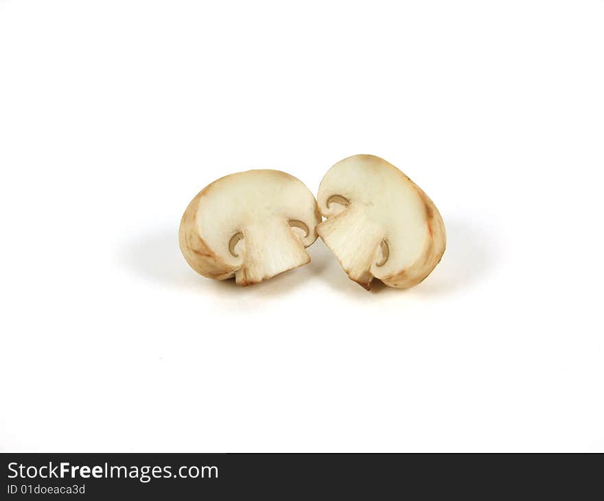 Two halfs of the mushroom on white background. Two halfs of the mushroom on white background