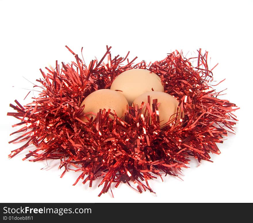 Three eggs in nest from christmas tree ornament