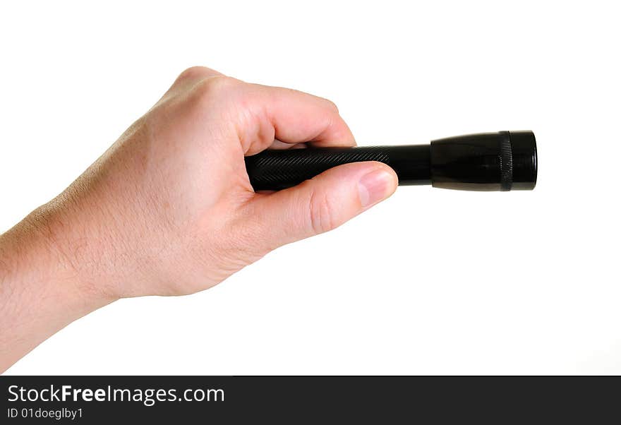 Hand holding small flashlight over white background