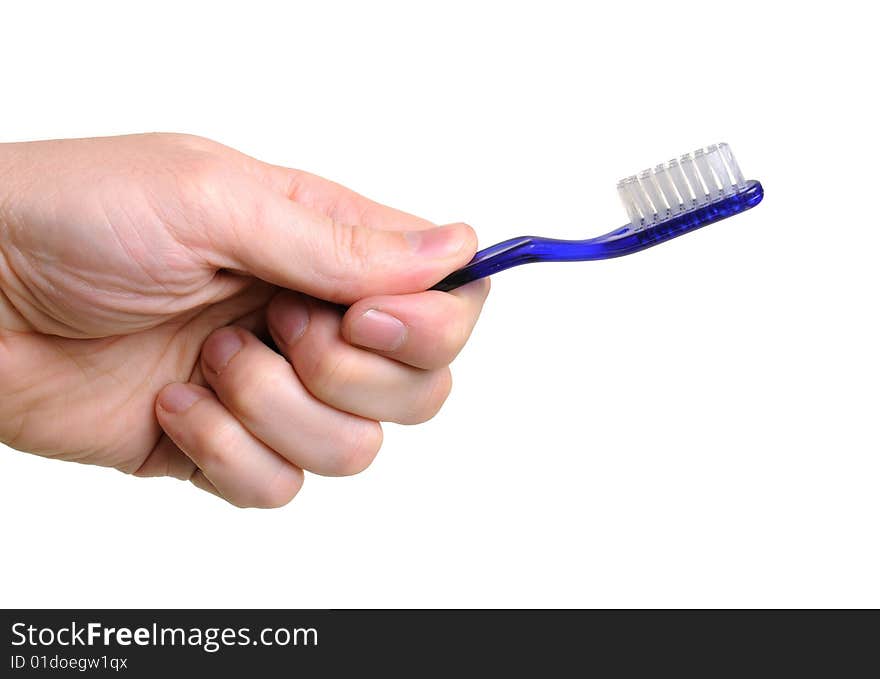 Hand holding blue toothbrush over white background. Hand holding blue toothbrush over white background