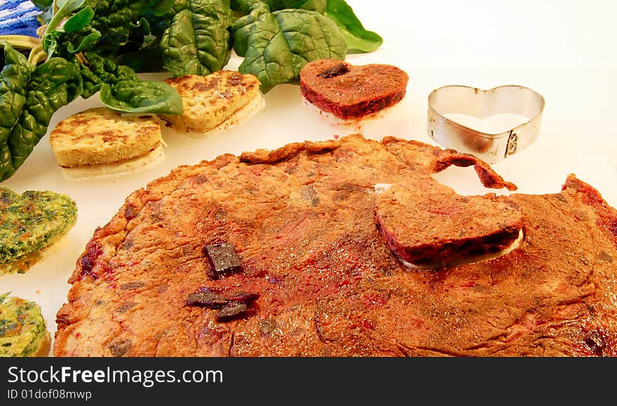 Shaping a beet omelette for Valentine's Day. Shaping a beet omelette for Valentine's Day