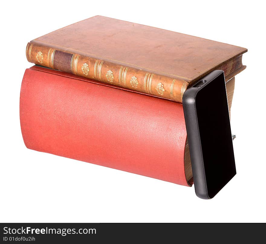 Old leather bound books with a computer hard drive isolated on a white background