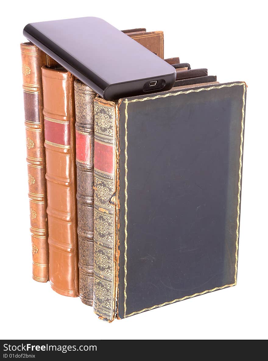 Old leather bound books with a computer hard drive isolated on a white background