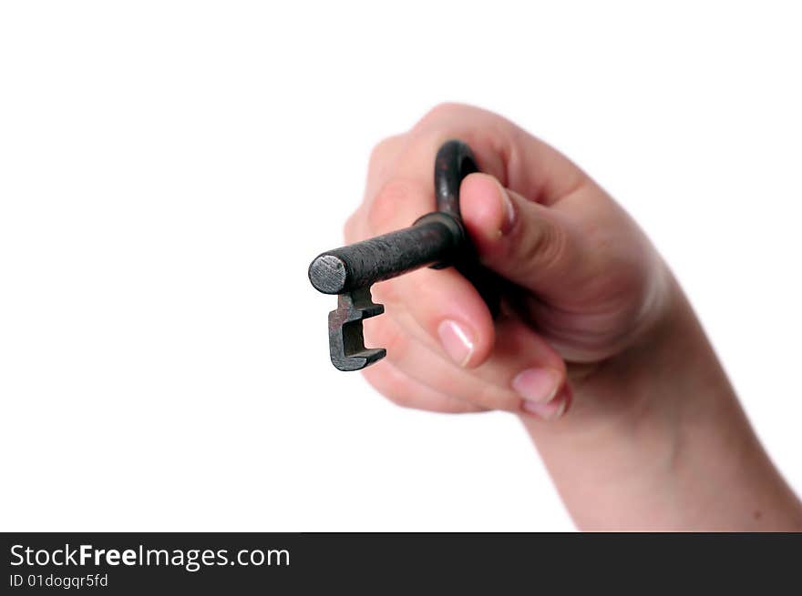 Key in a hand on white background