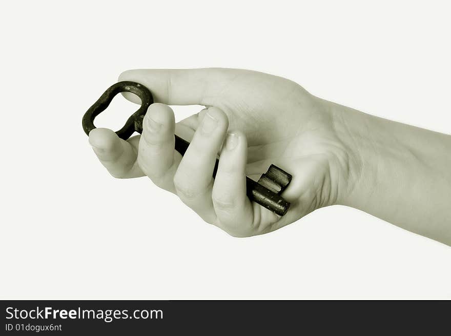 Key in a hand on white background