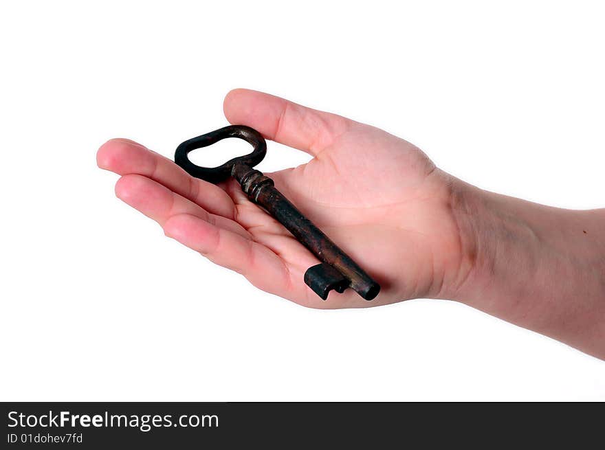 Key in a hand on white background