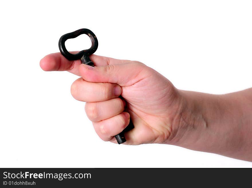 Key in a hand on white background