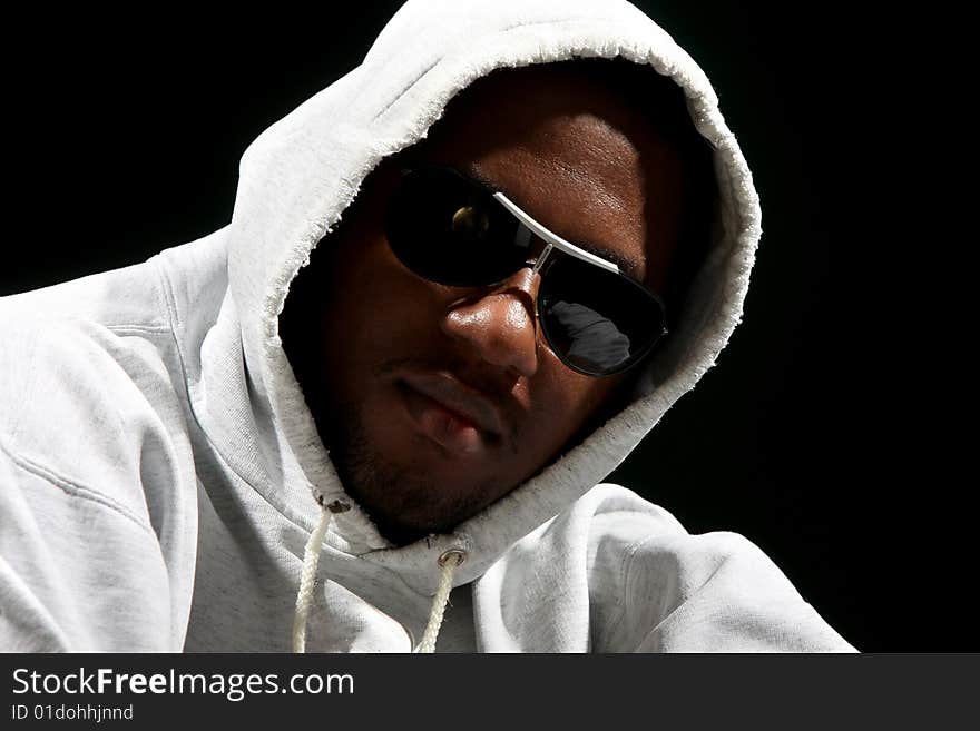 Young african american male on black background