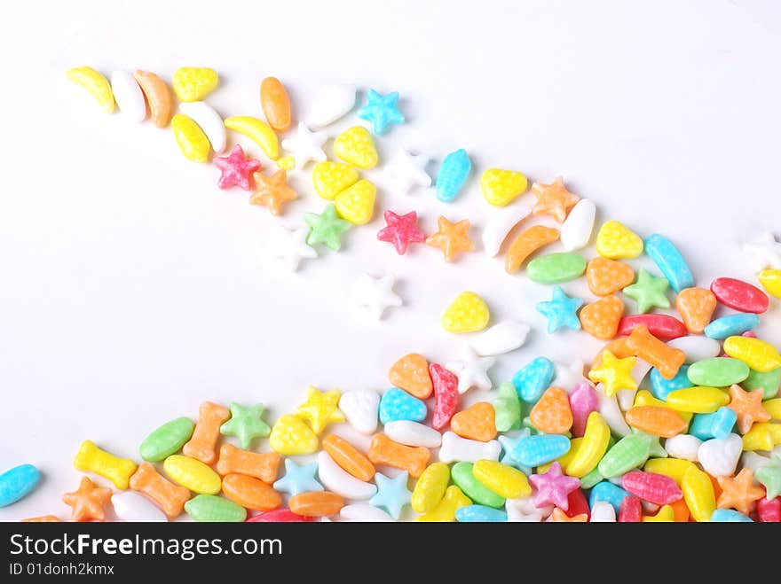 Colorful candy texture on white background