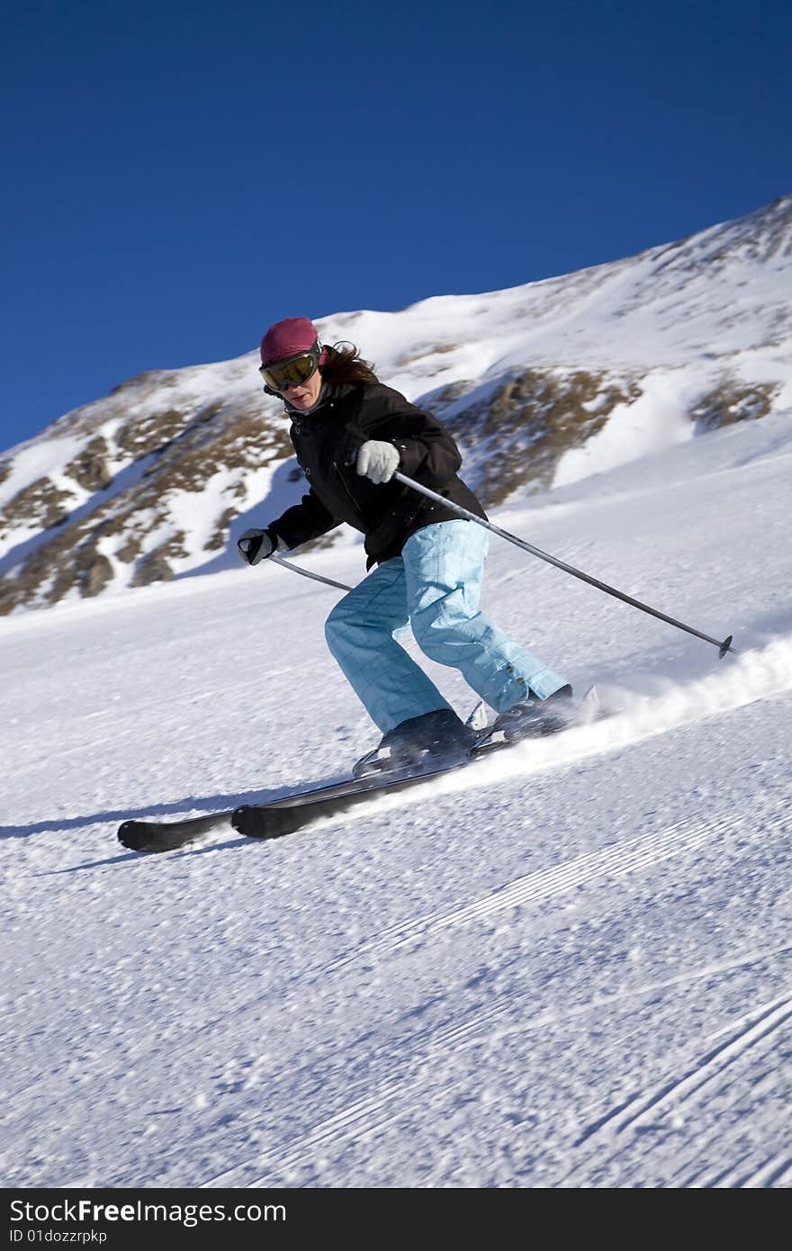 Young woman on the slope of mountain