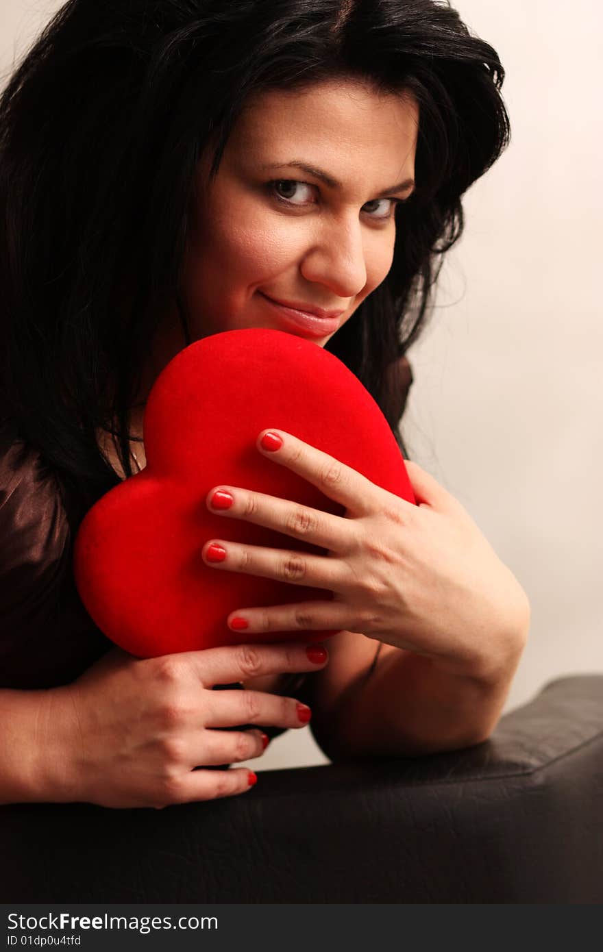 Woman with red heart isolater on white. Woman with red heart isolater on white