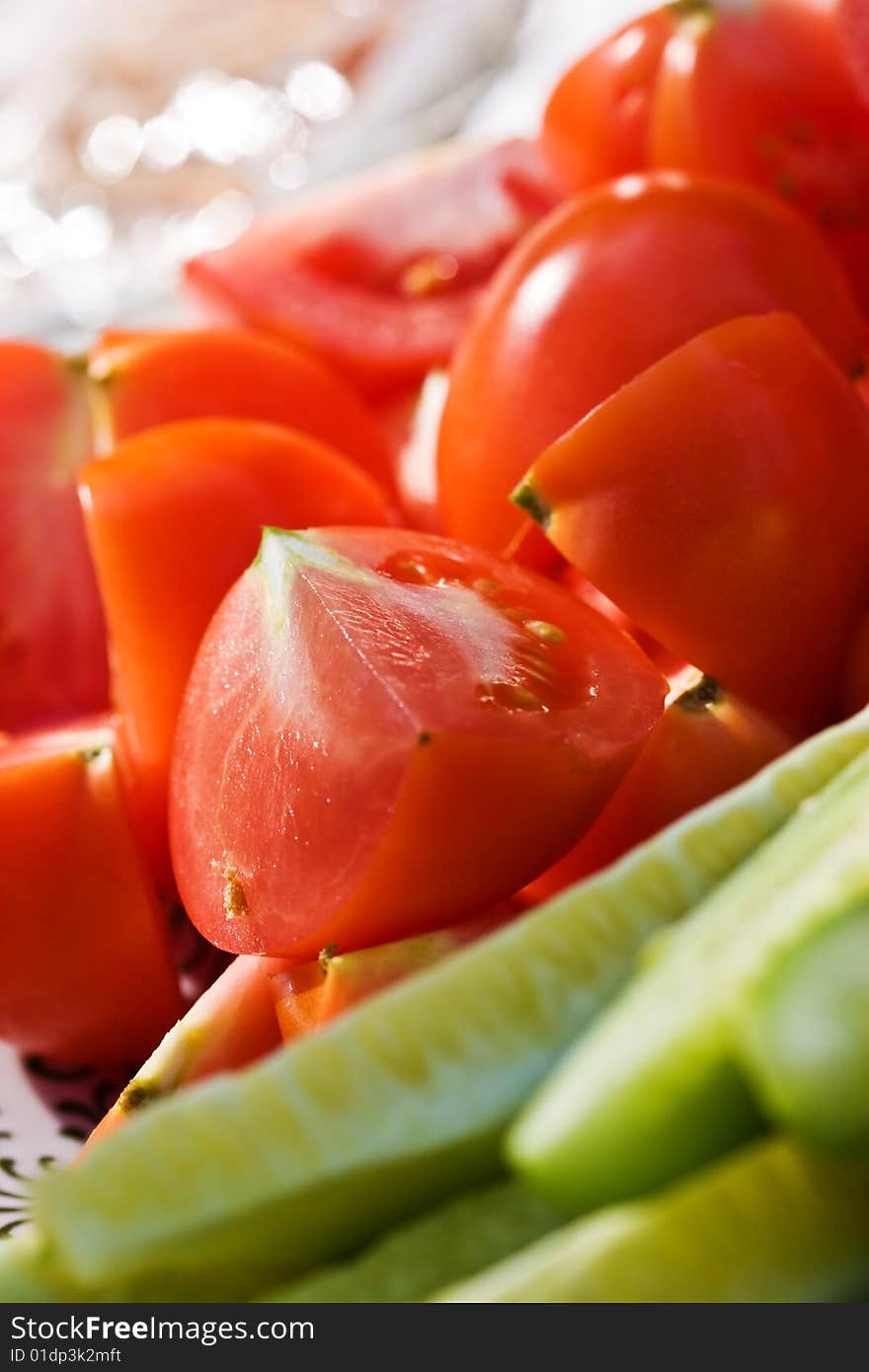 Food series: red fresh and ripe sliced tomatoes