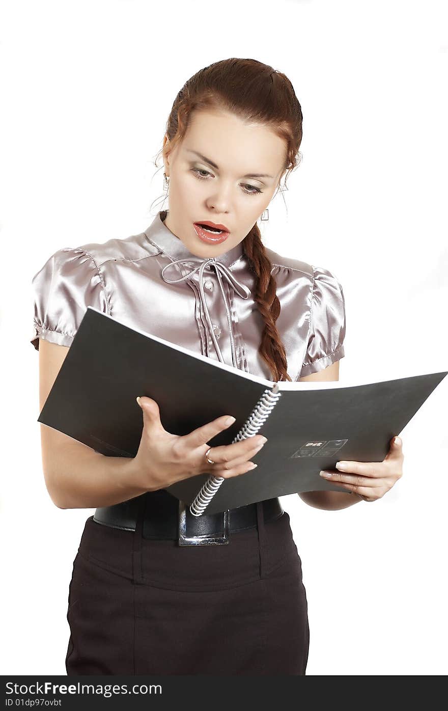 Girl looks in a folder with the documents