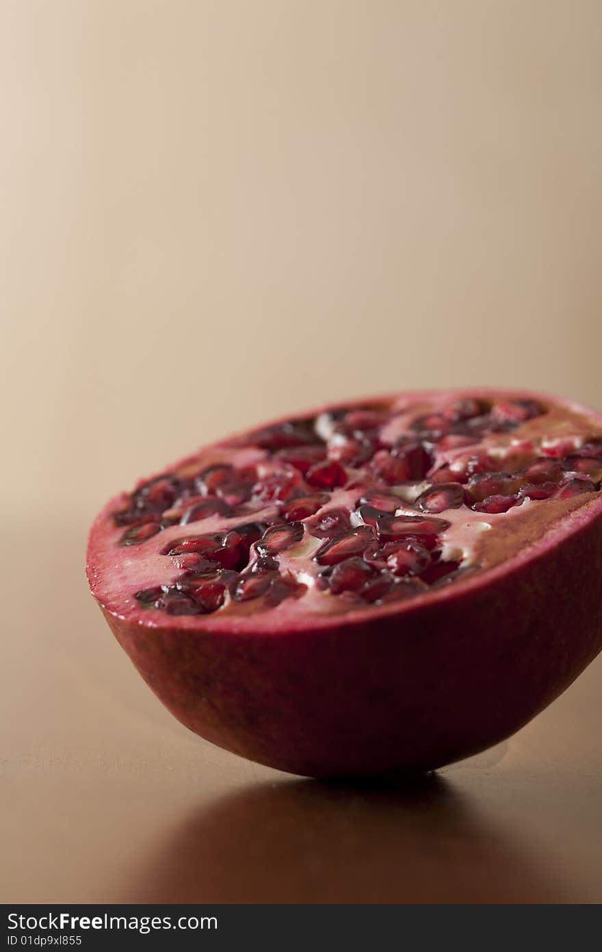 Fresh pomegranate half, tropical fruit