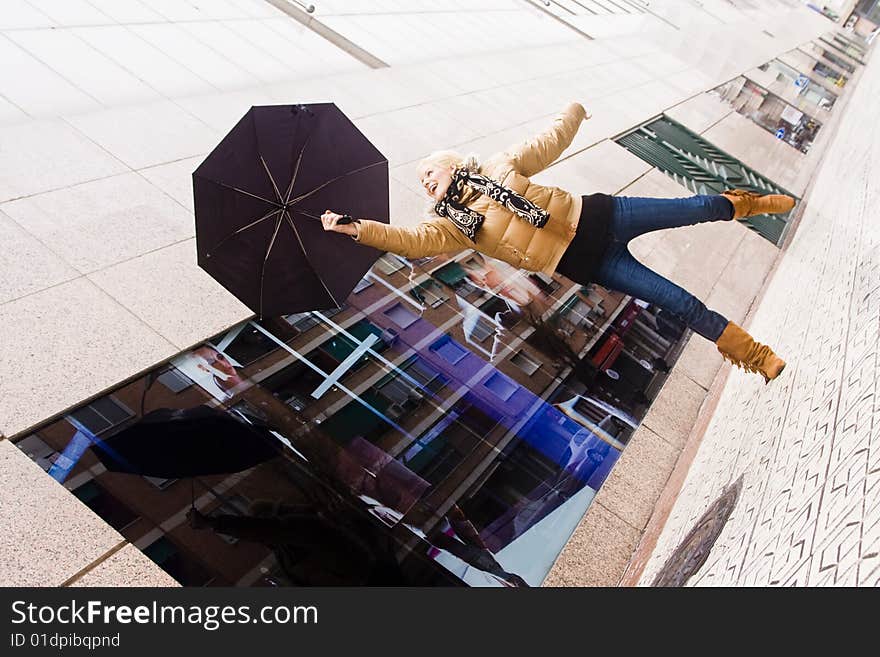 Happy blonde under rain