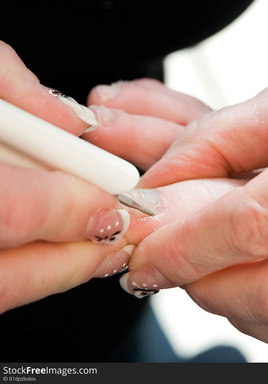 Foot therapist working on a pair of feet