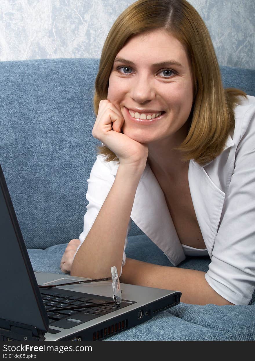 The young beautiful  girl with laptop. The young beautiful  girl with laptop