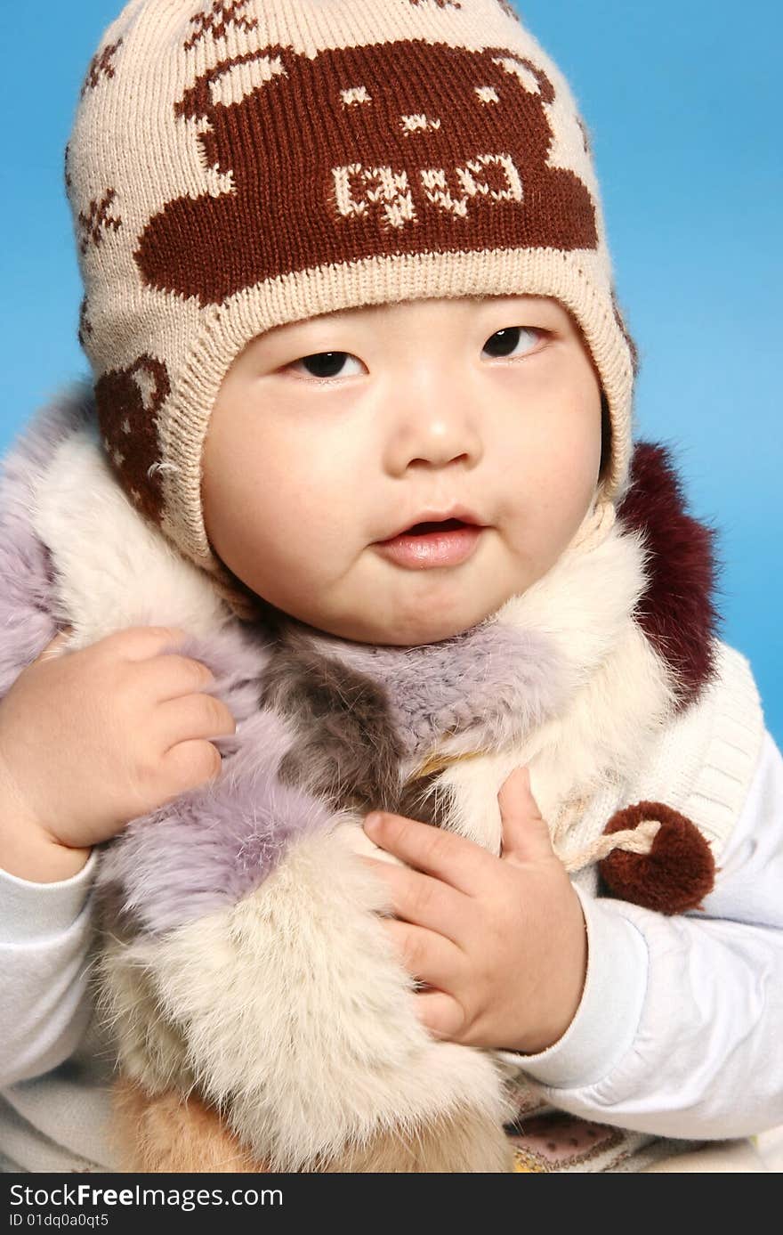 Chinese cute baby boy in winter. Chinese cute baby boy in winter