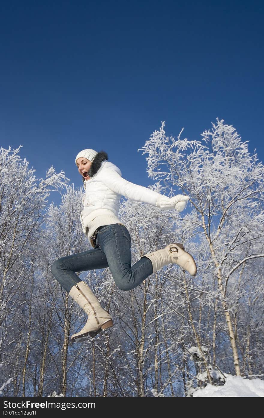 Happy jumping girl relaxing outdoors. Happy jumping girl relaxing outdoors