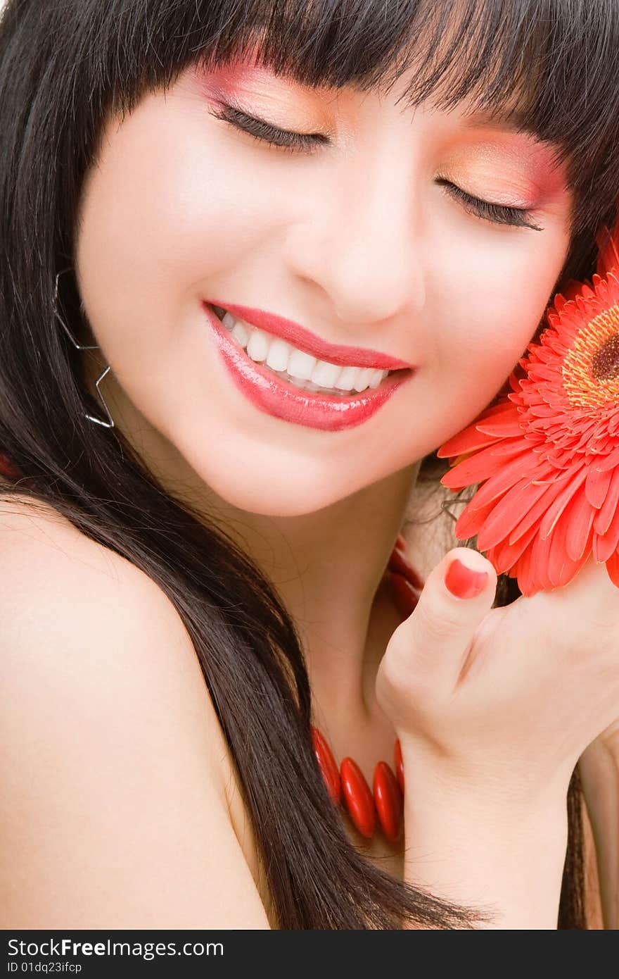 Young woman with red flower