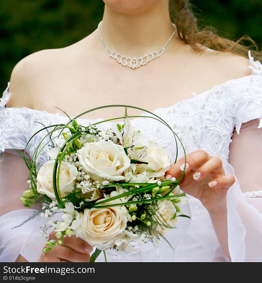 Wedding bouquet in bride s hands