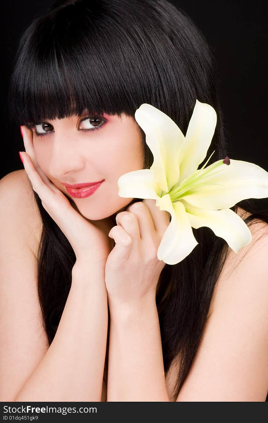 Young woman with lily flower. Young woman with lily flower