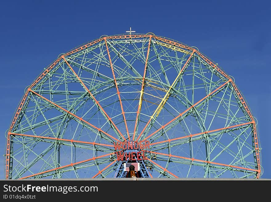 Attraction of wonder wheel on Conney Island in amusement park