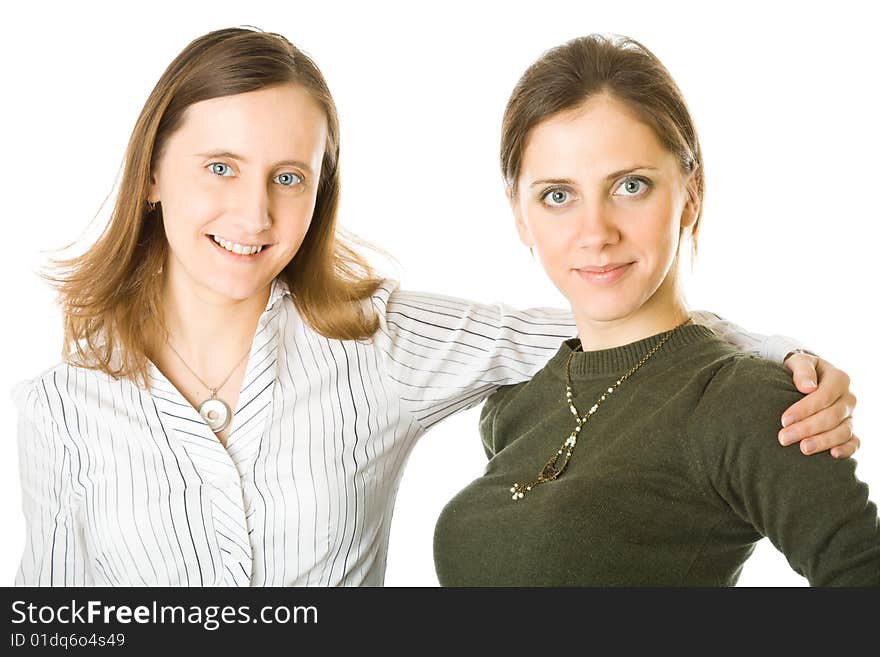 Two beautiful young women. Isolated on white background. Two beautiful young women. Isolated on white background