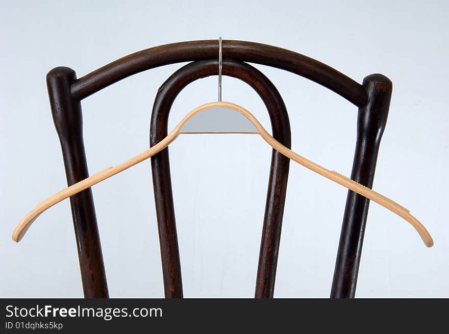 Cloth hanger on old chair