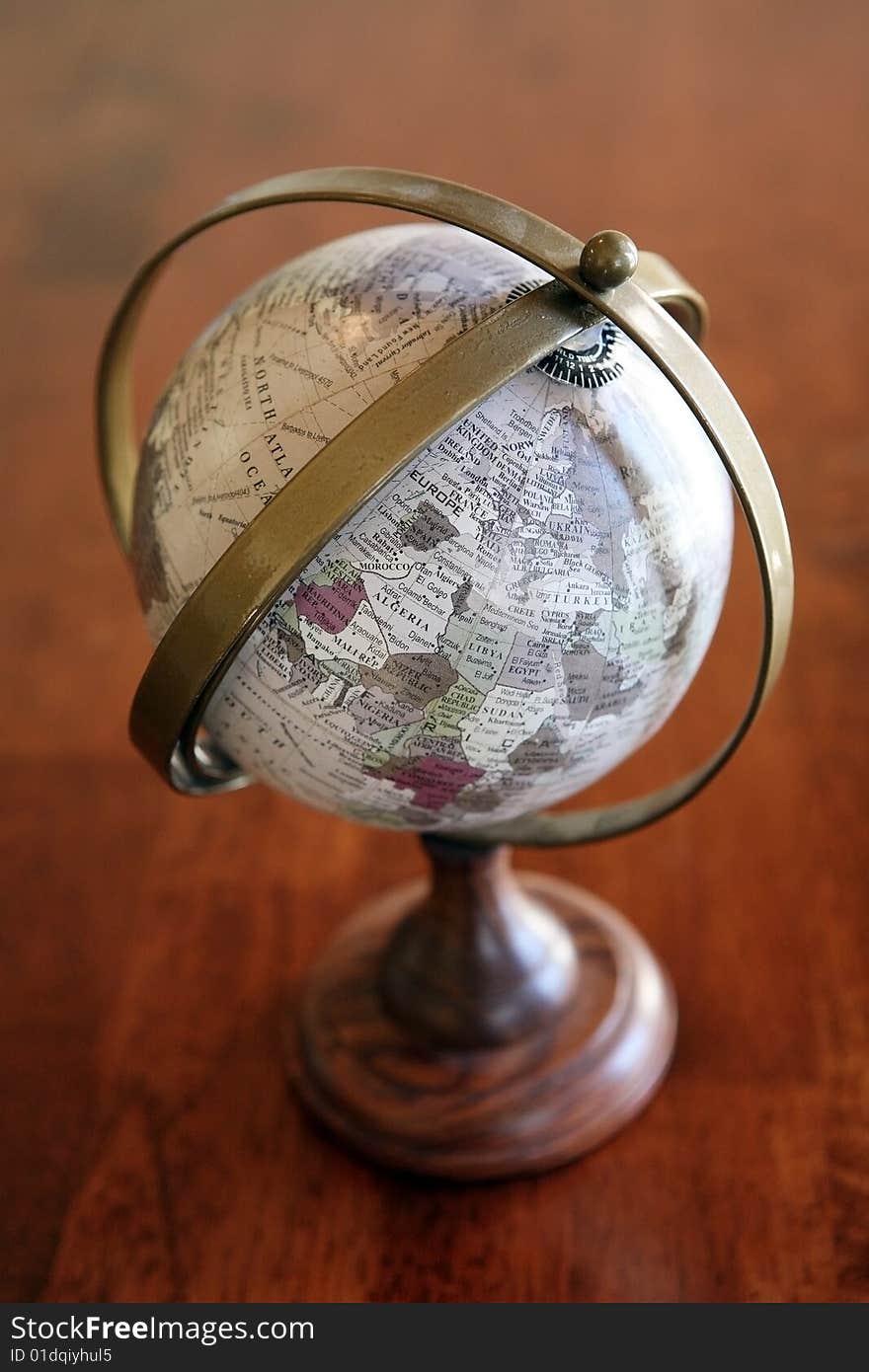 Diminutive Globe on the table.