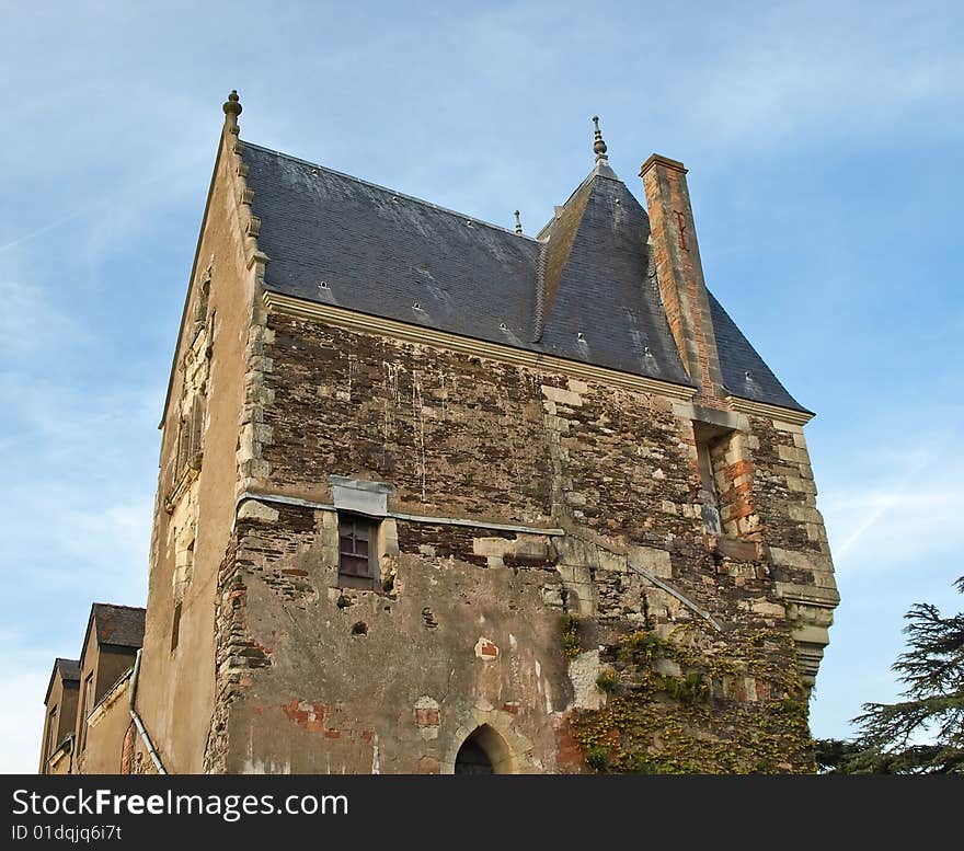 Medieval castle tower on sunset