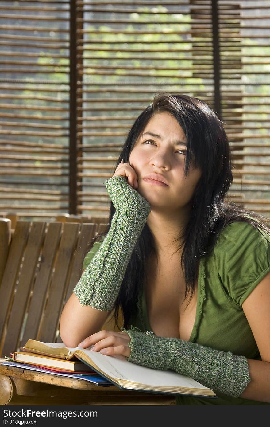 Female teen student wondering about the future. Female teen student wondering about the future.