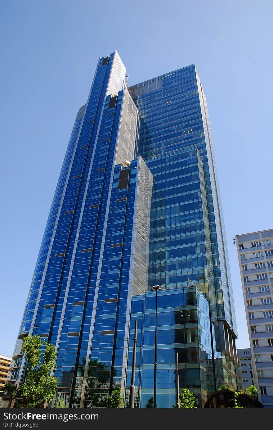 Modern building on the blue sky. Modern building on the blue sky