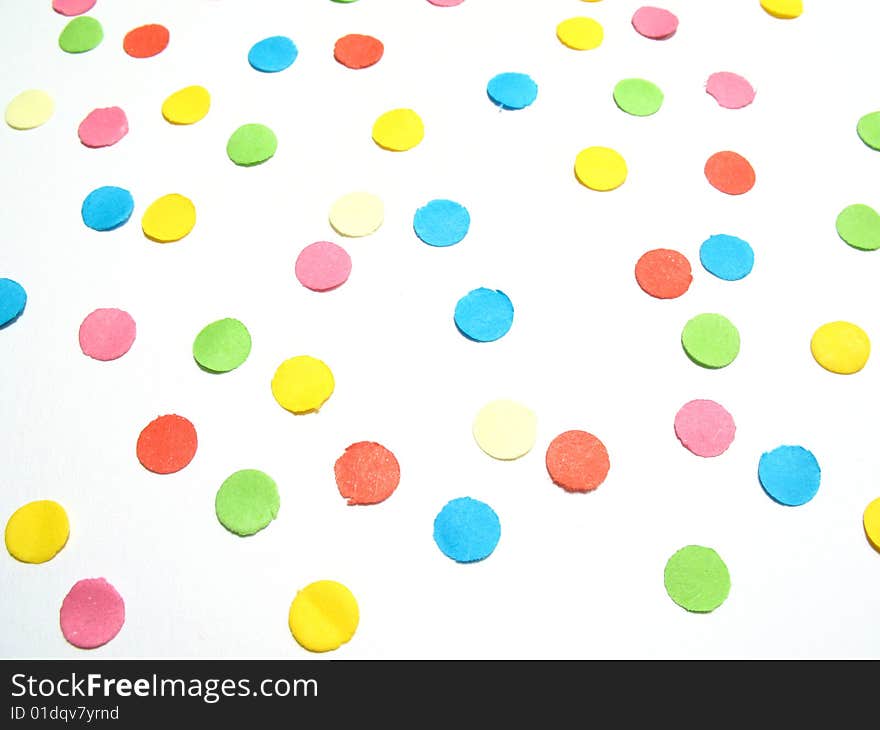 Isolated confetti, colored festive background