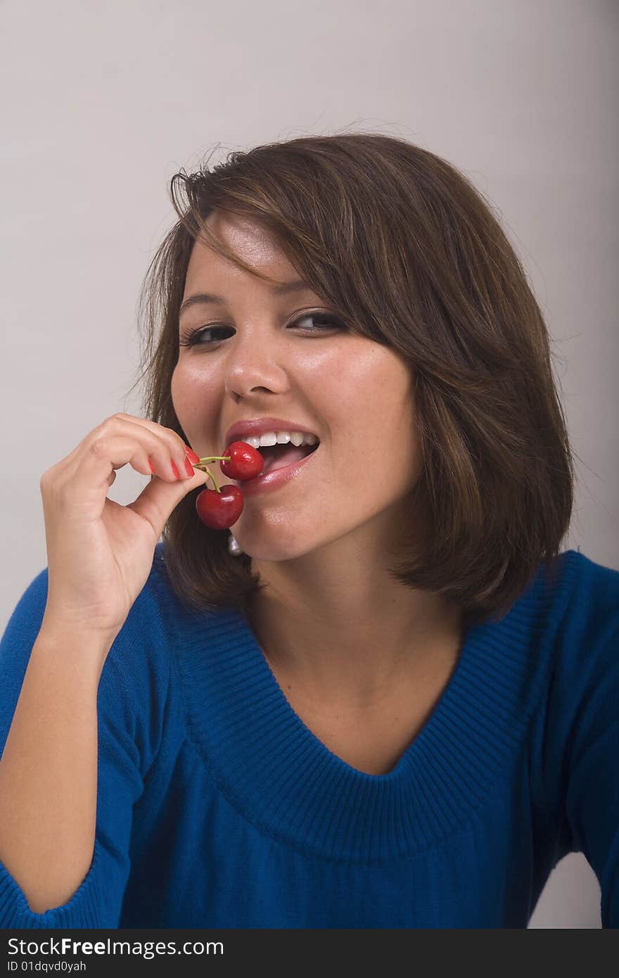 Girl Eating Red Cherries